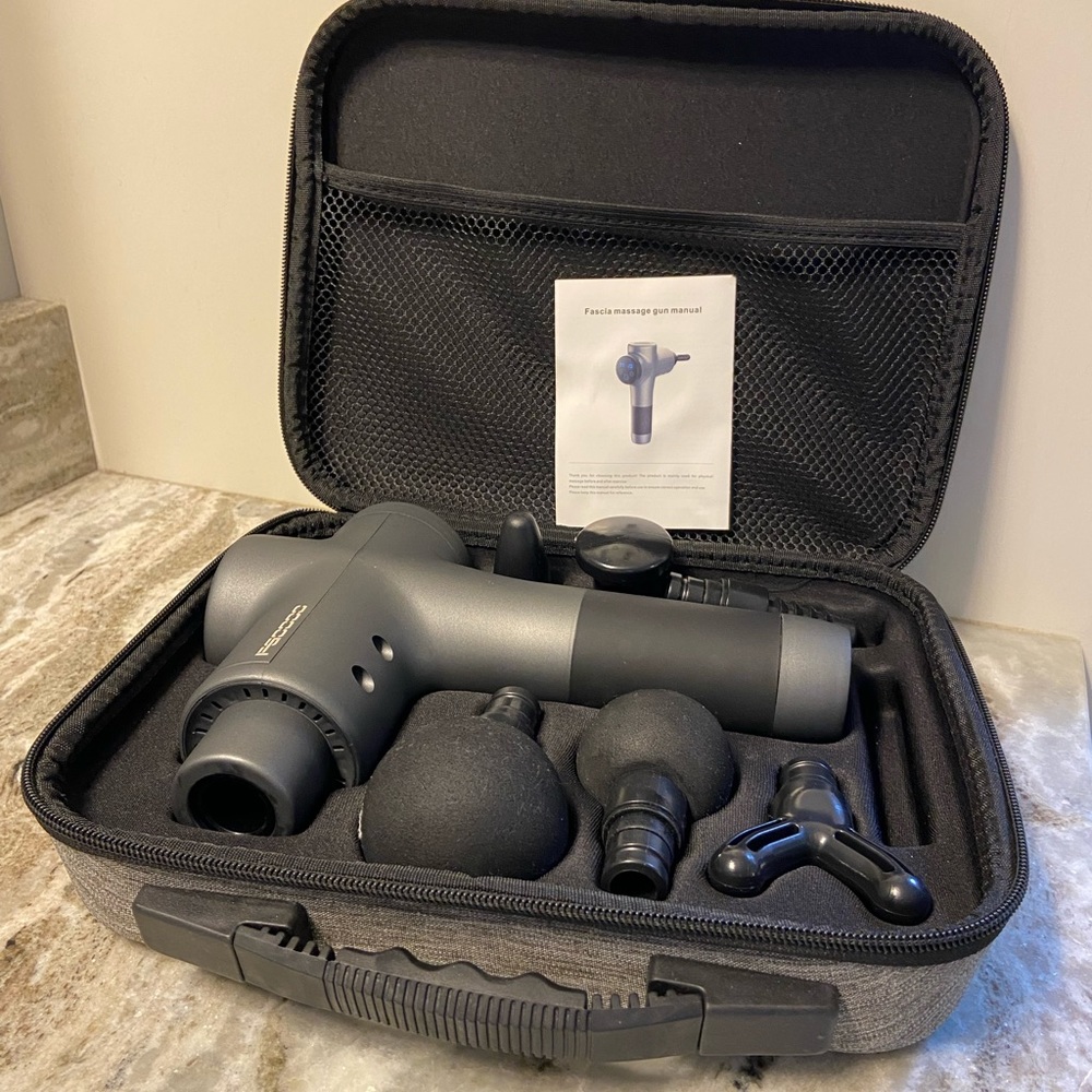 Massage gun with all the parts